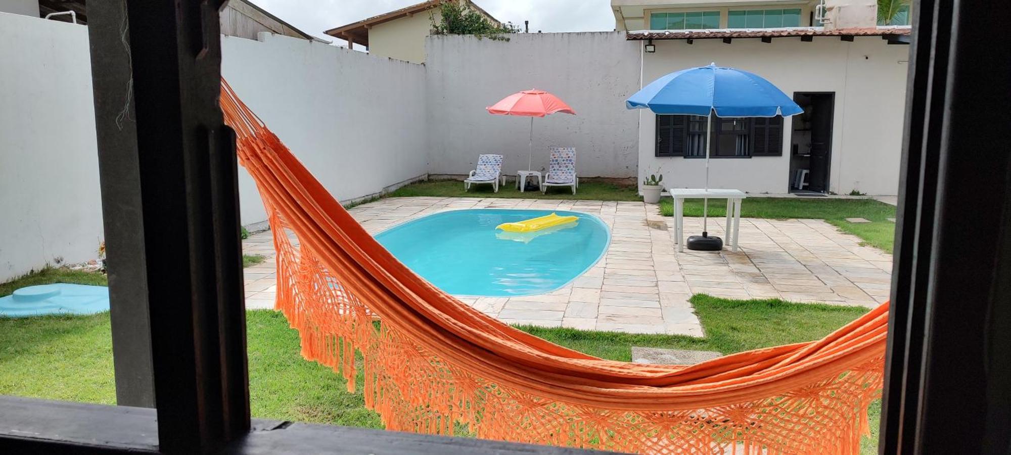 Quarto A 200m Da Praia Do Campeche Com Piscina Habitación en casa particular *